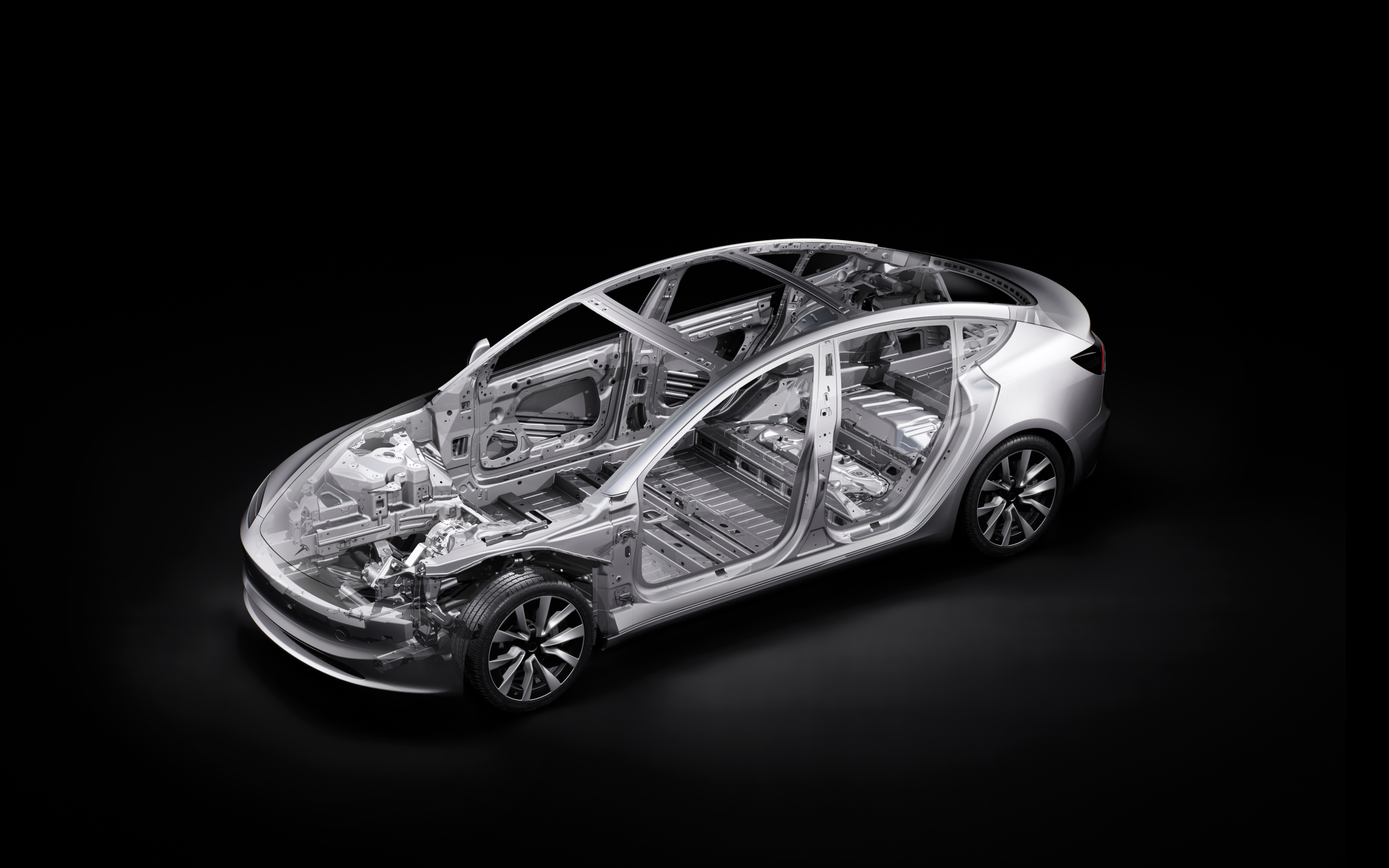 Side view of a Model 3 chassis with callouts pointing to various safety features.