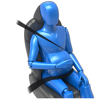 Pregnant woman with seat belt positioned between breasts and to the side of abdomen