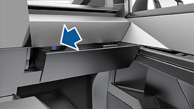 Glovebox open, revealing a USB-A drive