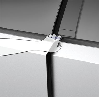 Close-up view of a hand opening the driver door by grasping the top edge, which is highlighted in blue